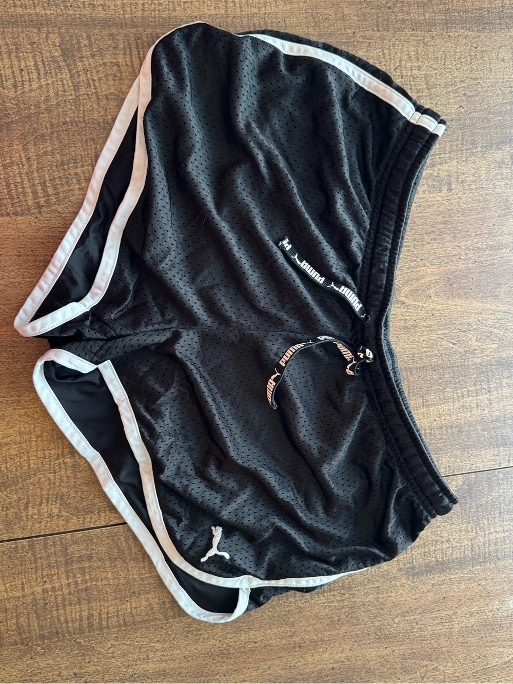 Puma Black Athletic Shorts with Red Brand Tags